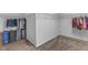 Spacious walk-in closet with ample shelving and storage space, perfect for organizing clothes and accessories at 512 Flip Trl, Cary, NC 27513