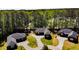 Aerial view of community showcasing well-maintained homes, mature trees, and manicured lawns at 524 Auguston Ct, Sanford, NC 27330