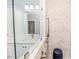 Bright and modern bathroom with white vanity, marble shower and matte black fixtures at 524 Auguston Ct, Sanford, NC 27330