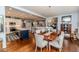 Bright dining room with wood floors, chandelier and views of kitchen and breakfast nook at 524 Auguston Ct, Sanford, NC 27330
