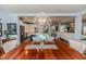 Dining room featuring wood table, chandelier, and views of kitchen and breakfast nook at 524 Auguston Ct, Sanford, NC 27330