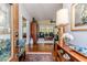 Welcoming entryway with hardwood floors, elegant decor, and views into the living area at 524 Auguston Ct, Sanford, NC 27330
