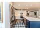 Modern kitchen featuring stainless steel appliances, white cabinets, and a large island at 524 Auguston Ct, Sanford, NC 27330