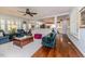 Spacious living room featuring an open floor plan and hardwood floors with stylish furnishings at 524 Auguston Ct, Sanford, NC 27330