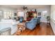 Cozy living room with hardwood floors, comfortable seating, and natural light at 524 Auguston Ct, Sanford, NC 27330