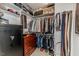 Organized walk-in closet with shelves, hanging rods, a chest of drawers and a Liberty Safe at 524 Auguston Ct, Sanford, NC 27330