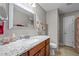 Bathroom featuring granite countertop, new fixtures, and a walk in shower at 524 Birdsong Ln, Hurdle Mills, NC 27541