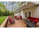 Spacious outdoor deck features comfortable seating, a retractable awning, and relaxing atmosphere at 524 Birdsong Ln, Hurdle Mills, NC 27541