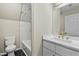 Bathroom featuring marble tile, modern vanity with marble countertop, and gold fixtures at 580 Greenbriar Farm Trl, Siler City, NC 27344