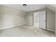 Neutral bedroom with a light-colored carpet, complemented by a bright white door at 580 Greenbriar Farm Trl, Siler City, NC 27344