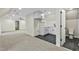 Open bonus room with a wet bar, featuring modern finishes, and a bathroom at 580 Greenbriar Farm Trl, Siler City, NC 27344