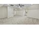Spacious bonus room featuring plush carpeting, a ceiling fan, and ample natural light at 580 Greenbriar Farm Trl, Siler City, NC 27344