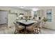 Spacious kitchen with a central island, stainless steel appliances, and modern finishes at 580 Greenbriar Farm Trl, Siler City, NC 27344