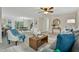 Bright and airy living room featuring neutral tones, modern furnishings, and an open-concept design at 580 Greenbriar Farm Trl, Siler City, NC 27344