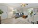 Comfortable living room featuring light walls, stylish decor, and wood-look flooring at 580 Greenbriar Farm Trl, Siler City, NC 27344