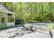 Relaxing backyard with a deck, gazebo, and fenced-in pool, perfect for outdoor entertaining at 5912 Weather Rock Ct, Raleigh, NC 27613
