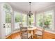 Charming breakfast nook filled with natural light, featuring a cozy table and picturesque outdoor views at 5912 Weather Rock Ct, Raleigh, NC 27613