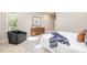 Comfortable primary bedroom, light-filled with stylish decor and furniture at 5912 Weather Rock Ct, Raleigh, NC 27613
