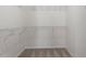 Walk-in closet with white wire shelving at 632 Hunters Ridge Dr, Fuquay Varina, NC 27526