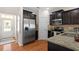 Open kitchen featuring stainless steel appliances and granite countertops at 632 Hunters Ridge Dr, Fuquay Varina, NC 27526