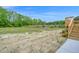 Backyard with newly planted grass at 66 Privette Way, Zebulon, NC 27597