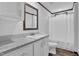 Bathroom featuring white vanity, sink, toilet, mirror, and shower with shower curtain at 66 Privette Way, Zebulon, NC 27597
