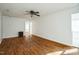 Spacious living room with hardwood floors and plenty of natural light at 704 N King Charles Rd, Raleigh, NC 27610