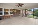 Relaxing screened porch with brick accents, great for enjoying the outdoors while staying protected at 705 N Gurney St, Burlington, NC 27215