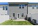 Compact backyard with a concrete patio, perfect for relaxing or outdoor dining at 713 Putney Hill Rd, Zebulon, NC 27597