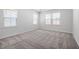Bright bedroom features neutral paint, carpet flooring and lots of natural light at 728 Ben Ledi Ct, Raleigh, NC 27603