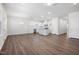 Open-concept kitchen with white cabinetry, stainless steel appliances, granite countertops, and island at 728 Ben Ledi Ct, Raleigh, NC 27603