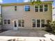Rear exterior with patio and plenty of windows for natural light at 7425 Silver View Ln, Raleigh, NC 27613