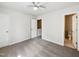 A cozy bedroom features neutral carpet, closet, and en-suite bathroom access at 7425 Silver View Ln, Raleigh, NC 27613