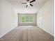 Large bedroom features plush carpet, neutral walls and lots of natural light at 7425 Silver View Ln, Raleigh, NC 27613