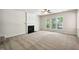 Living room boasts neutral walls, plush carpet and a beautiful fireplace at 7425 Silver View Ln, Raleigh, NC 27613