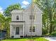 Charming two-story home with a cozy front porch and professionally landscaped yard at 811 Fargo St, Durham, NC 27707