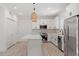Stylish kitchen featuring a large island, modern appliances, and ample counter space at 811 Fargo St, Durham, NC 27707