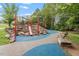 Inviting playground with slides, climbing structures, and colorful surfaces for active play and fun at 811 Fargo St, Durham, NC 27707
