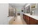 Spacious bathroom with large vanity, tub and shower with glass door at 85 Rivers Edge Ct, Timberlake, NC 27583