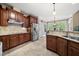 Well-equipped kitchen with stainless steel appliances and granite countertops at 85 Rivers Edge Ct, Timberlake, NC 27583
