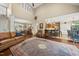 Open-concept living room boasts vaulted ceilings and seamless flow into kitchen at 85 Rivers Edge Ct, Timberlake, NC 27583
