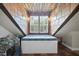 Charming window bench with natural light, a comfortable seating area, and textured tile work for a serene atmosphere at 85 Rivers Edge Ct, Timberlake, NC 27583