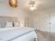 Cozy bedroom with whitewashed furniture and comfortable bedding at 8805 Stage Ford Rd, Raleigh, NC 27615