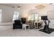 Spacious living room with sloped ceilings, large sectional sofa, and windows at 8805 Stage Ford Rd, Raleigh, NC 27615