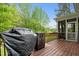 View from the deck to the screened-in porch and the trees in the background at 9016 New Century Rd, Wake Forest, NC 27587