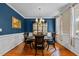 Formal dining room with a chandelier, table, and stylish decor at 9016 New Century Rd, Wake Forest, NC 27587