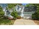 Charming two-story home with an attached garage and landscaped yard at 9016 New Century Rd, Wake Forest, NC 27587