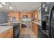 Well-equipped kitchen featuring an island, modern appliances, and plenty of cabinet space at 906 Circle Dr, Creedmoor, NC 27522