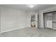 Bedroom featuring a closet, an open door, and a stylish light fixture at 9212 Linslade Way, Wake Forest, NC 27587