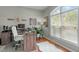 Bright home office with a large window, hardwood floors, and a comfortable workspace at 9212 Linslade Way, Wake Forest, NC 27587